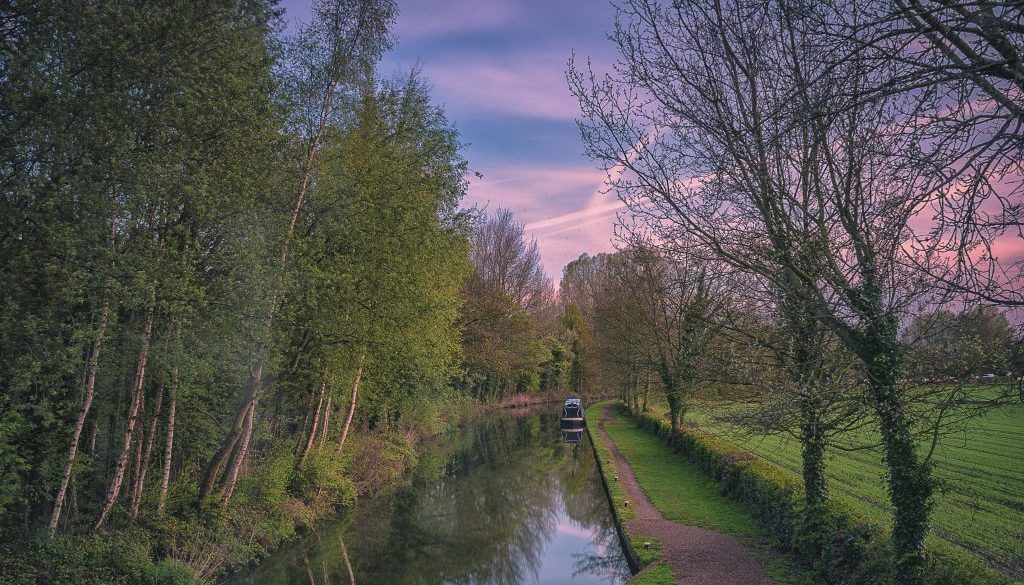 A tranquil spring morning along the Birmingham and Fazeley Canal near Drayton in Staffordshire, UK