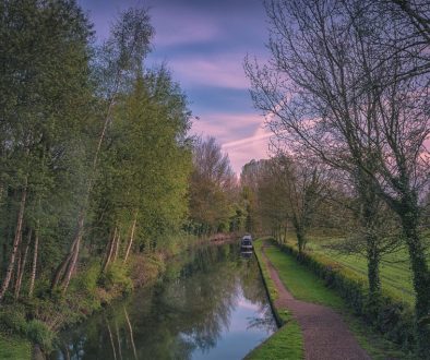 A tranquil spring morning along the Birmingham and Fazeley Canal near Drayton in Staffordshire, UK